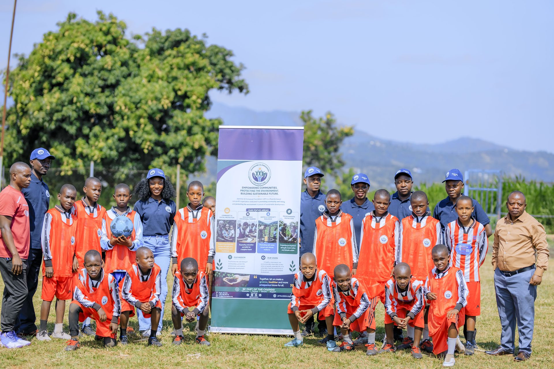 JEF youth football programme with staff and community members